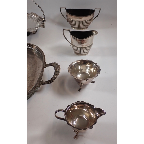 243 - A silver plated two handled tray, an eggcup stand and other silver plated items including WMF candle... 