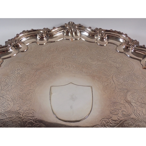 245 - A Victorian large silver plated pie crust edge tray 60cm diameter