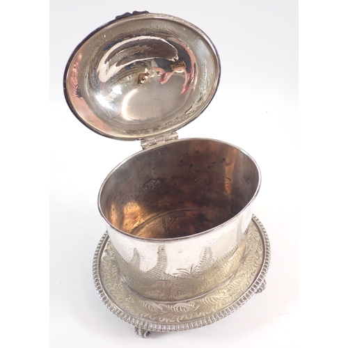 246 - A Victorian silver plated biscuit barrel, decorated ferns and swan finial, 21cm tall, a brass trinke... 