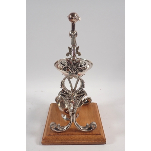 247 - A silver plated lemon squeezer/juicer on wooden base, 26cm tall with silver plated jug