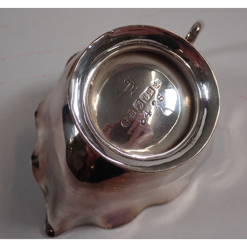 247 - A silver plated lemon squeezer/juicer on wooden base, 26cm tall with silver plated jug