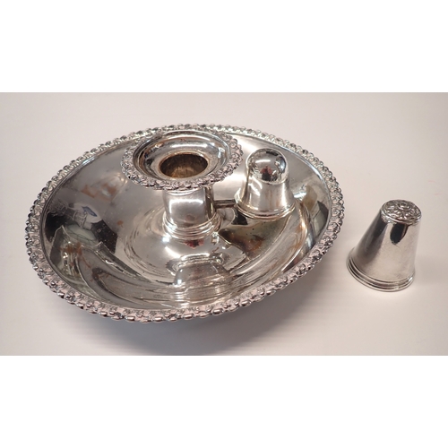 249 - A silver plated chamber stick with candle snuffer, 17cm wide