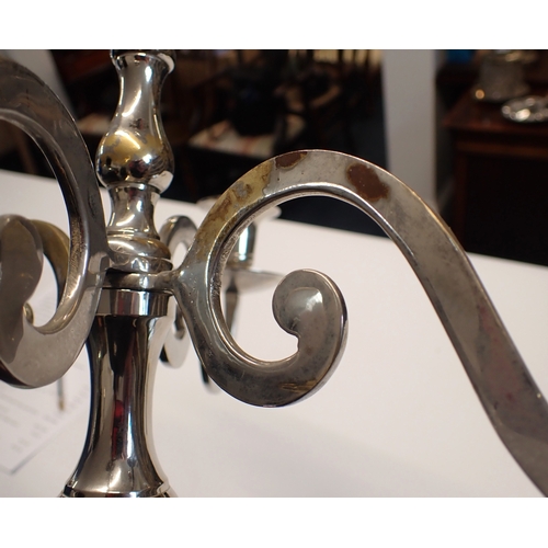 253 - A pair of tall silver plated four branch candelabra, 75cm