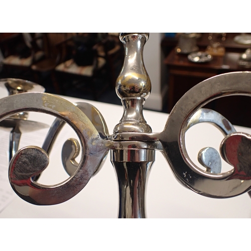 253 - A pair of tall silver plated four branch candelabra, 75cm