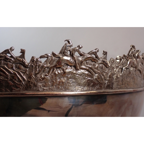 254 - A large silver punch bowl with racehorses to rim 39cm diameter, 29cm tall, 4.17kg, London 2003 by E&... 