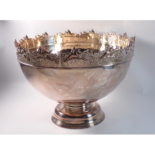 254 - A large silver punch bowl with racehorses to rim 39cm diameter, 29cm tall, 4.17kg, London 2003 by E&... 