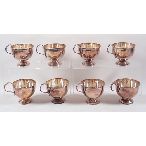 255 - A set of eight silver punch cups by Hampton Utilities, Birmingham 2004, 915g
