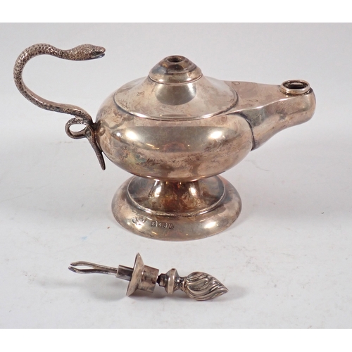 259 - A silver table lighter in the form of an oil lamp with snake handle - 9cm, total weight 82.5g