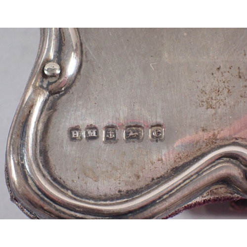 262 - A silver easel back picture frame with heart shaped window by Henry Matthews, Birmingham 1902, windo... 
