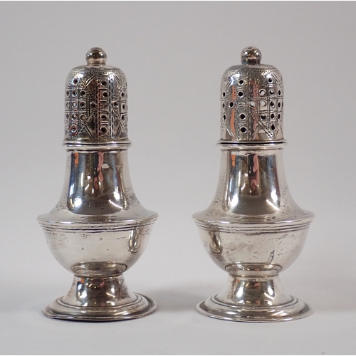 267 - A pair of silver pepper pots by Hilliard & Thomasson, Birmingham 1899, 7cm high, 41g