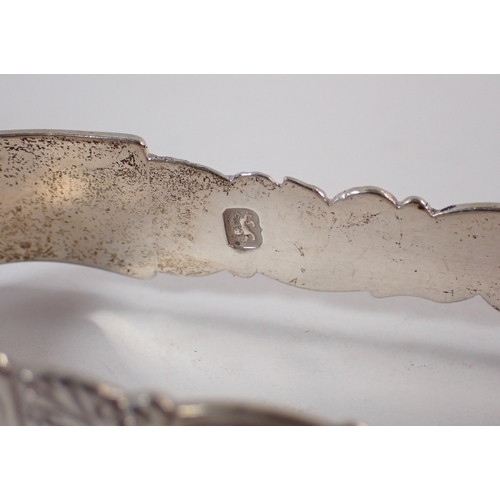 268 - A scrap silver pair of sugar tongs, 42g