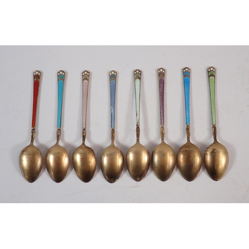 275 - Eight Swedish silver gilt and enamel harlequin coffee spoons, total weight 64.4g