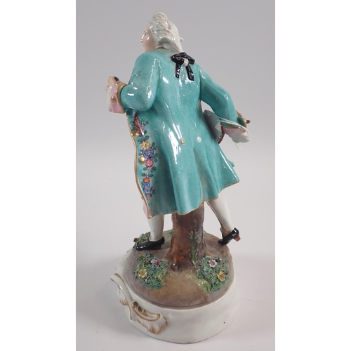 34 - A 19th century Meissen style porcelain figure of a tennis player with double crossed swords mark to ... 