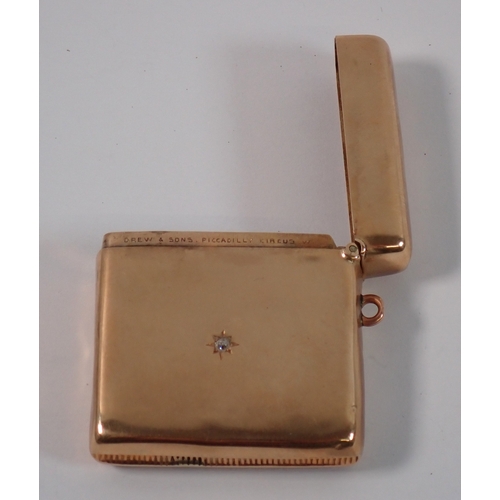 374 - A 9ct gold vesta case inset diamond, Chester 1900, Drew & Sons Piccadilly Circus, 4cm long, 22g