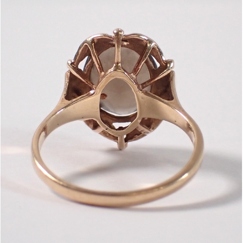 381 - A 9ct gold ring set oval smoky quartz, size Q-R, 3.9g