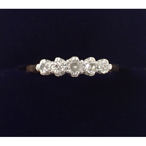 382 - An 18ct gold five stone diamond ring, size S, 3.7g