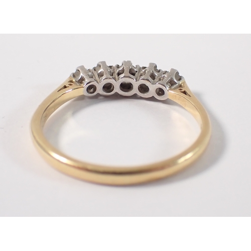 382 - An 18ct gold five stone diamond ring, size S, 3.7g