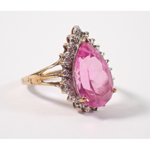 383 - A 9ct gold ring set tear drop cut pink synthetic sapphire, size M-N, 3.4g