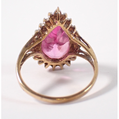 383 - A 9ct gold ring set tear drop cut pink synthetic sapphire, size M-N, 3.4g