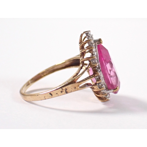 383 - A 9ct gold ring set tear drop cut pink synthetic sapphire, size M-N, 3.4g