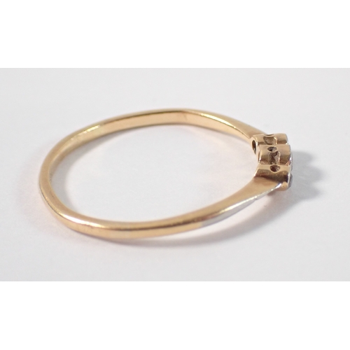 387 - An 18ct gold platinum three stone diamond ring, one diamond deficient, size P-Q, 1.5g