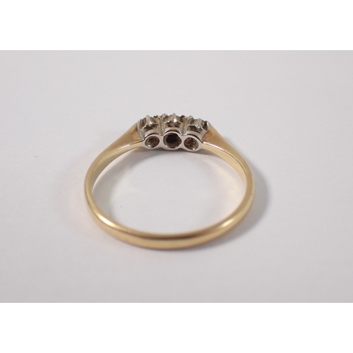 396 - An 18ct gold ring set three diamonds, size L, 1.7g