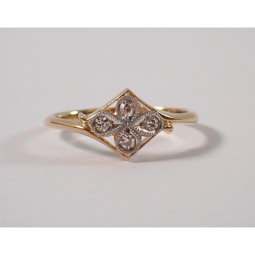 397 - An Art Deco 18ct gold ring set four diamonds in a quatrefoil head, size N, 2g