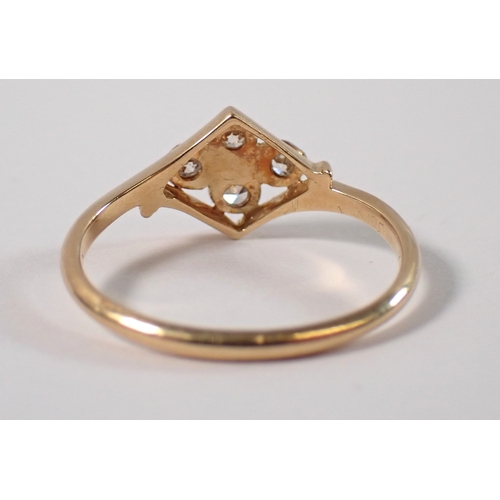 397 - An Art Deco 18ct gold ring set four diamonds in a quatrefoil head, size N, 2g