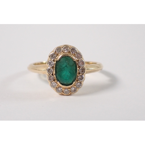 399 - An 18ct gold ring set emerald within diamond surround, size M, 3g