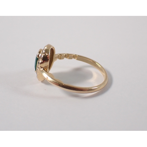 399 - An 18ct gold ring set emerald within diamond surround, size M, 3g
