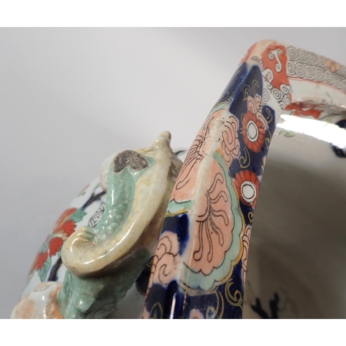 4 - A Victorian Fenton ironstone footbath with dolphin handles and floral printed decoration, 46cm wide