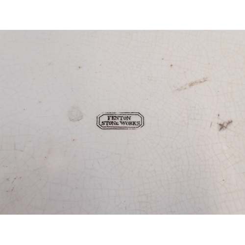 4 - A Victorian Fenton ironstone footbath with dolphin handles and floral printed decoration, 46cm wide
