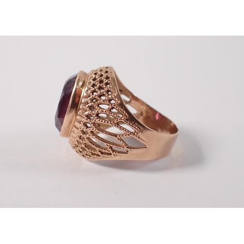 401 - A Russian 14 carat gold ring set large oval cut synthetic purple sapphire in gold filigree setting, ... 