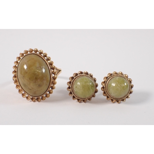 407 - A 9ct gold green connemara marble ring, and a pair of matching earrings, ring size N, total weight 6... 