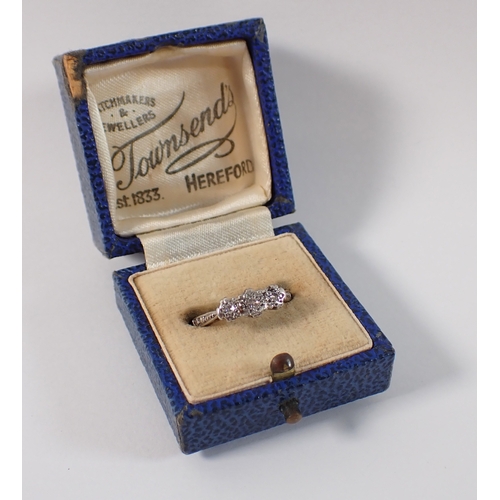 408 - An antique 18ct gold and platinum ring, illusion set three diamonds, size K to L, 2g