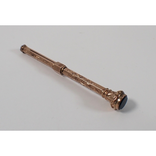 416 - A 9ct gold propelling pencil and dip pen with engraved decoration and bloodstone terminal, 9cm long,... 