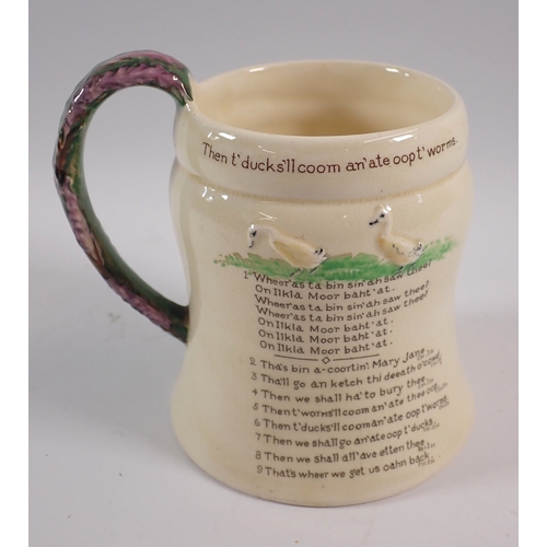 45 - A musical Crown Devon Fieldings tankard 'On Ilkla Moor Baht'at' 13cm tall