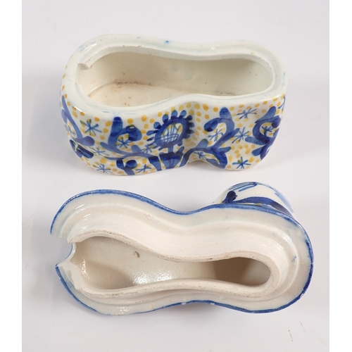 54 - A Spanish tin glazed cat form box, 13cm tall