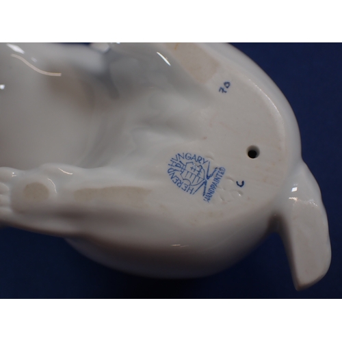 55 - A Herend white rabbit with raised paw, 10cm tall