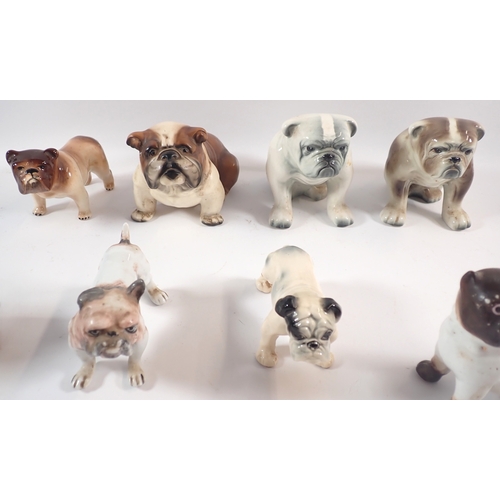 56 - A group of ceramic bulldog themed ornaments including one by Margaret Howard, tallest 11.5cm