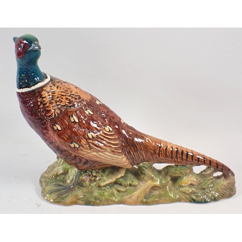 57 - A Beswick large fox and pheasant, 19cm tall