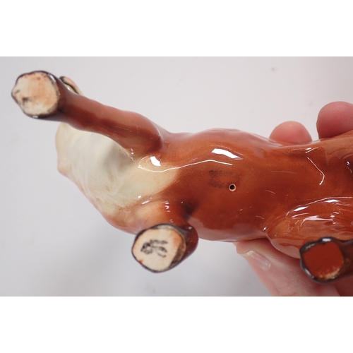 57 - A Beswick large fox and pheasant, 19cm tall
