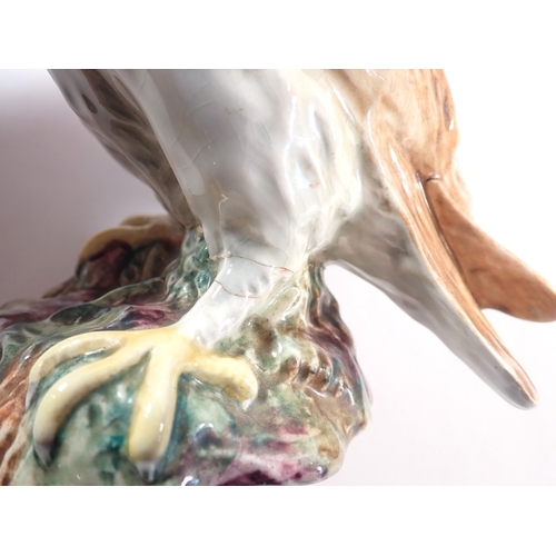59 - A collection of Beswick birds including green woodpecker, two barn owls, cuckoo and thrush, 14cm tal... 