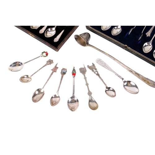 40 - A small group of silver and silverplated flatware. Including two boxed part sets of silverplated tea... 