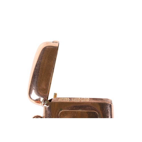 54 - A 9ct gold vintage vesta case. Undecorated except with a raised rectangle to one side, with hallmark... 