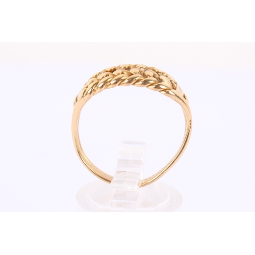59 - An 18ct gold ring. With 'braided' centrepiece, hallmarked to shank. Misshapen size S, weight 5.5g.