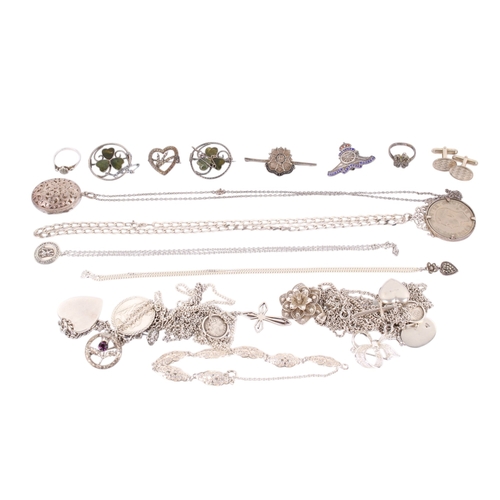 183 - A group of silver and white metal jewellery. Including necklaces and pendants, a pomander, coin pend... 