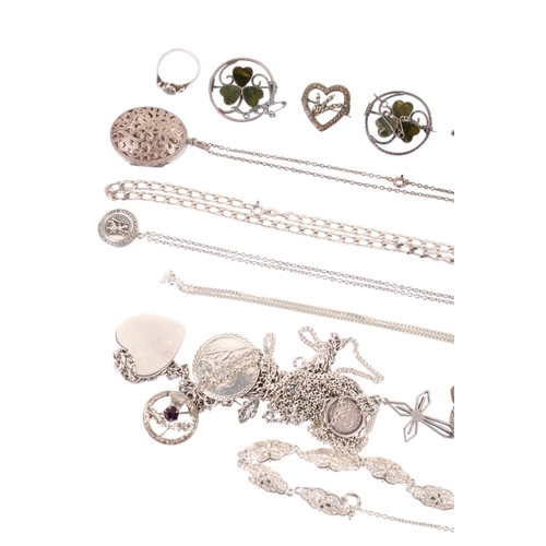 183 - A group of silver and white metal jewellery. Including necklaces and pendants, a pomander, coin pend... 