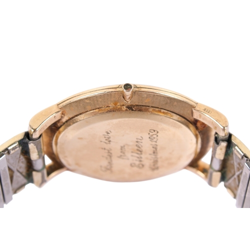 195 - A 9ct gold gentleman's Omega wristwatch. Gold markers and subsidiary dial to the cream face, hallmar... 