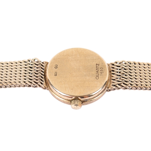 196 - A 9ct gold lady's Omega wristwatch. With gilt markers to the round gold face, case diameter 1.8cm, c... 